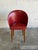 This vintage accent chair features a curved barrel silhouette with an enveloping backrest. Vintage Mid-Century Modern...