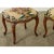Dimensions: 18 ¼” H x 19” W x 15 ½” D A pair of Louis XV-style footstools from the 19th century with floral needlepoint...