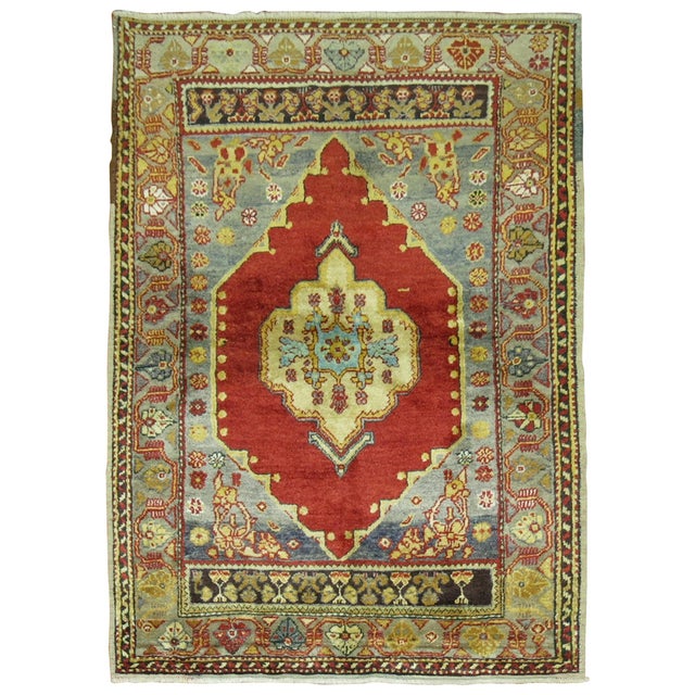 A scatter-sized antique Turkish Oushak rug 3'6'' x 4'10''