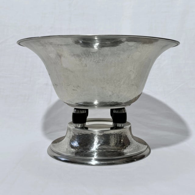 A graceful art deco bowl produced in the 1930s by swedish maker guldsmedsaktiebolaget (gab) located in the town of...