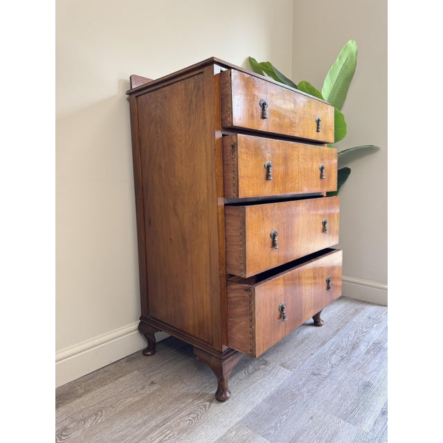This is a beautifully crafted solid wooden chest of drawers. comprised of 4 drawers, all with dovetail ends and original...