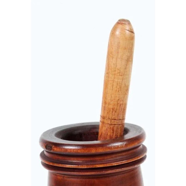 Antique wooden footed mortar and pestle. Handcrafted in Italy, nice patina. Total height with pestle: 14" Mortar is 9"5 x...
