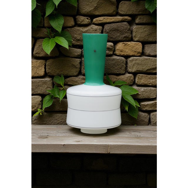 Mid-Century Modern Lamp in Opal Glass, in Very Good conditions. Designed 1950 to 1959 This piece is designed in the style...