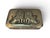 Gold toned metal box with relief of lions on the lid.