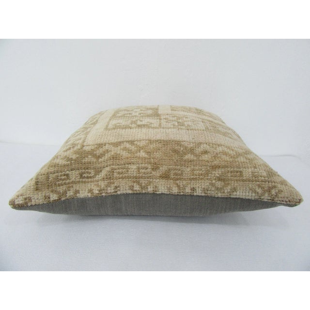 This is a pillow cover made from a vintage kilim rug. The piece was properly washed and ready to use. Pillow inserts not...