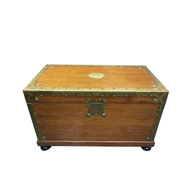 18th century camphor wooden chest with brass, osnabrück, anno 1784 a camphor wooden chest, mounted with brass, raised on...