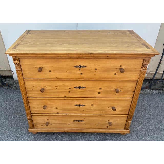 This massive pine chest of four more or less equal depth hand-cut dovetailed drawers is about as handsome as they come....