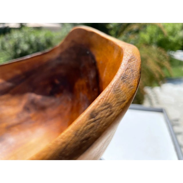 This bowl is a decorative bowl, made in France circa 1960. It is the French Riviera Style. The Olive wood is in a brown...
