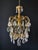 The chandelier is crafted from brass – a beautiful and elegant piece of artistic wroughtwork. Decorated with magnificent...