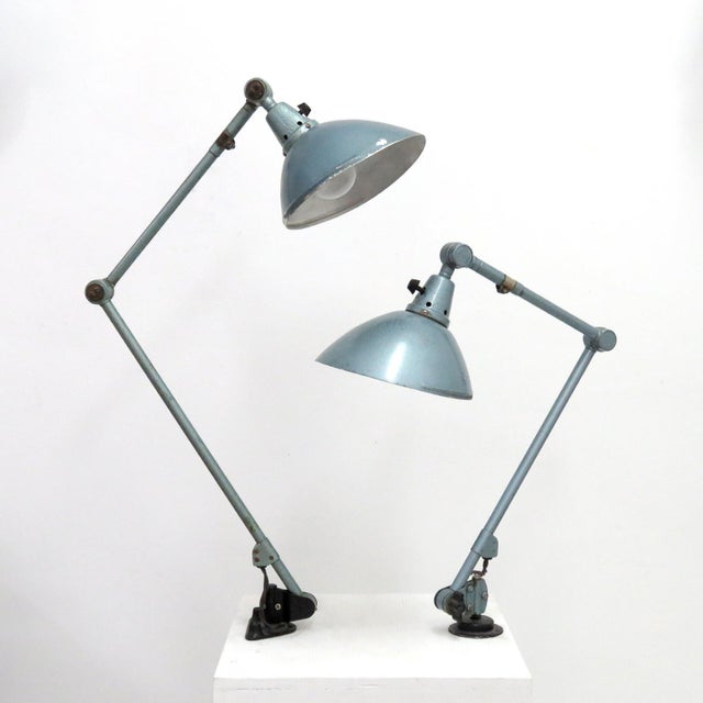Wonderful 1920s articulating table-mounted desk lamps by Curt Fischer for Midgard in original grey-green hammer finish and...