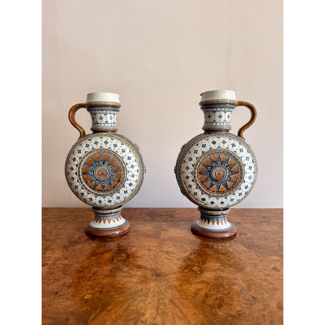 Fine quality pair of antique 19th century Villeroy & Boch ewers, having a quality pair of 19th century Villeroy & Boch...