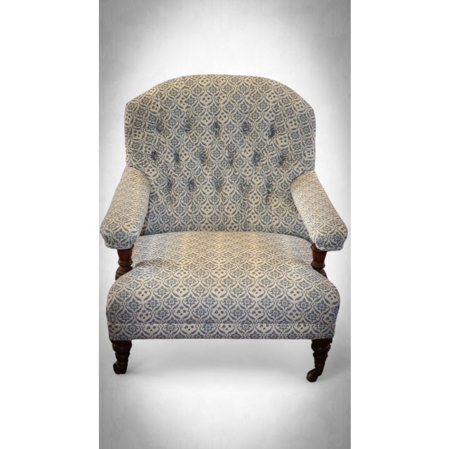 Buttoned Lounge Chair in Ticking Fabric from Howard & Sons, in Very Good conditions. Designed before 1890 This piece has...