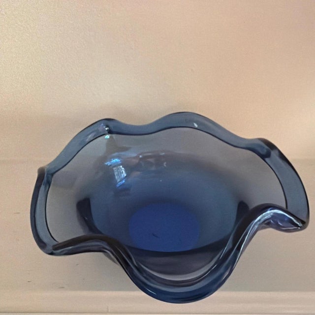This Vintage Cobalt Blue Murano Style Clam Shell Style Bowl features a beautiful cobalt blue color that adds a touch of...