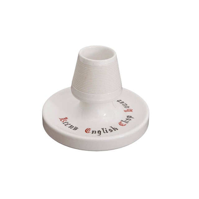 A vintage ceramic match striker and holder. Custom-made for Keen’s English Chop House, a steakhouse still open at 72 West...