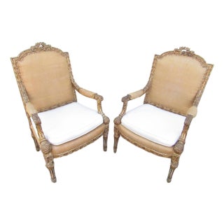 Pair of Antique French Louis XVI Style Giltwood Armchairs For Sale