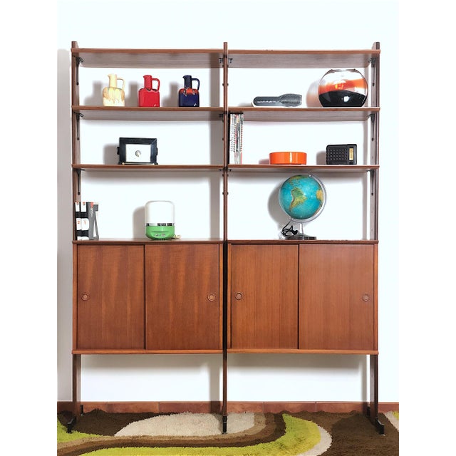 Double-sided modular bookcase with 2 bays from the 1960s. The bookcase is of Italian manufacture, completely restored and...