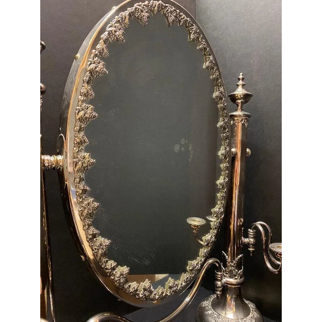 Large English sheffield silver dressing mirror with candle holders and fine detail. Has wood back.