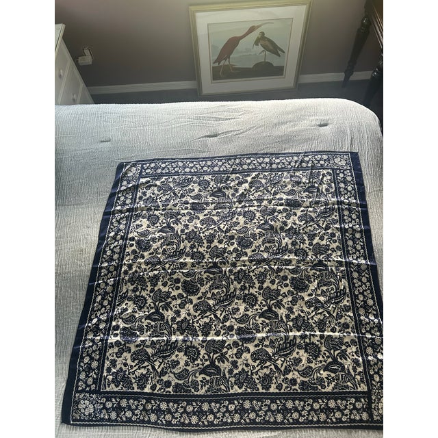 Beautiful vintage silk scarf by TIDI, featuring an elaborate allover bird and floral motif in rich navy blue and warm...