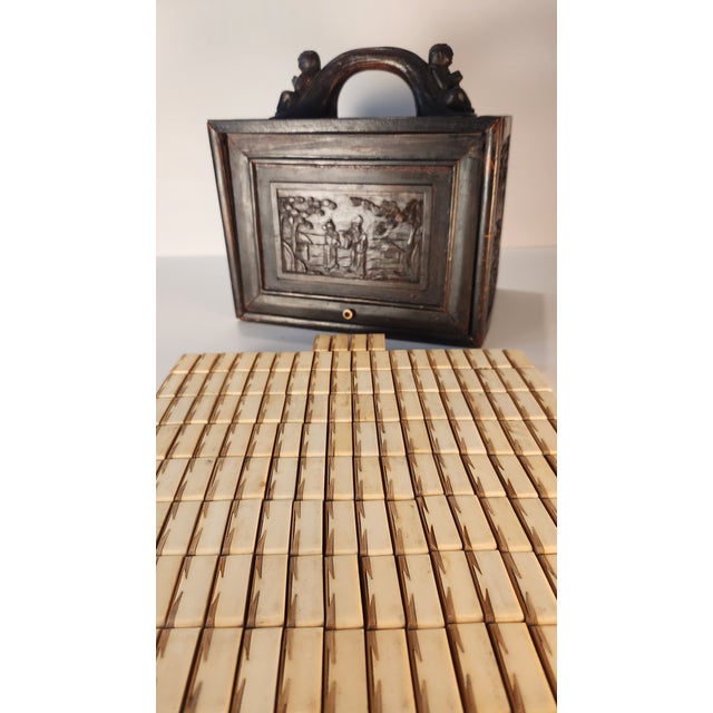This is a wonderful 1920s antique mahjong set produced in China for the international market. It includes 144 tiles + 4...