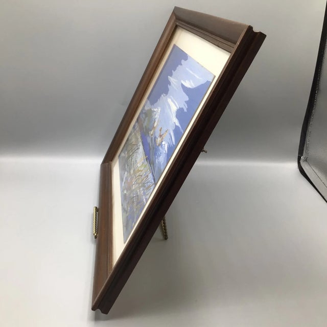 Here is a impressionist oil on art board painting of two mallard ducks in flight over a pond with snow covered mountains...