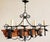 Vintage Spanish Revival hand crafted and hand forged wrought iron chandelier with center wood beam. The chandelier...