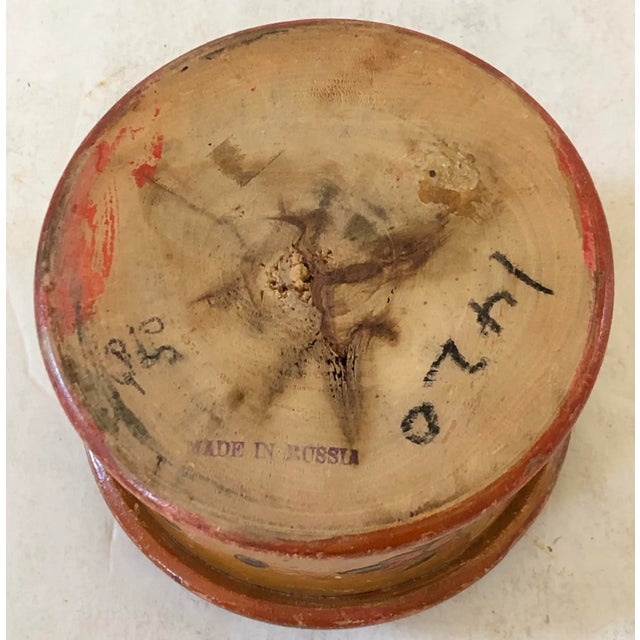 Winter traveler with backpack and walking stick walking through the snow is the image painted onto this lovely box. Turned...