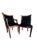 Striking pair of vintage Empire style side chairs featuring bold zebra upholstery and classic sculptural lines. Elegant...