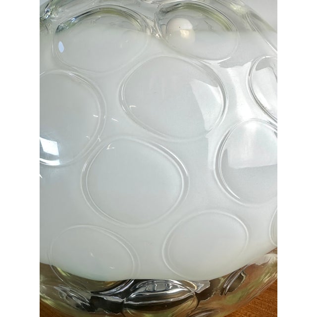 Vintage Murano blown and bubbled glass lamp, likely dating from the 1970s. This lamp is distinguished by its imposing...