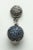 A pair of ball drop earrings with round, faceted blue sapphires in a pave` setting covering the entire ball. The post is...