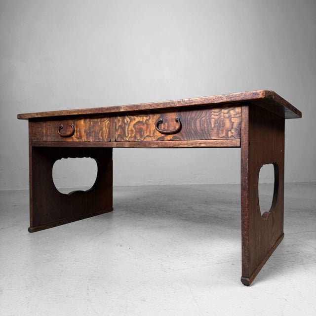 This elegant low writing desk is a classic Japanese floor piece, known in Japan as a fumizukue (文机): a low desk...
