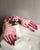 Add a playful and cozy touch to any room with this handmade pink hand shaped pillow . Crafted from soft velvet fabric and...