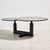 A true Italian postmodern piece from the 1980s. The Up & Up coffee table with exciting shapes has two movable granite tops...