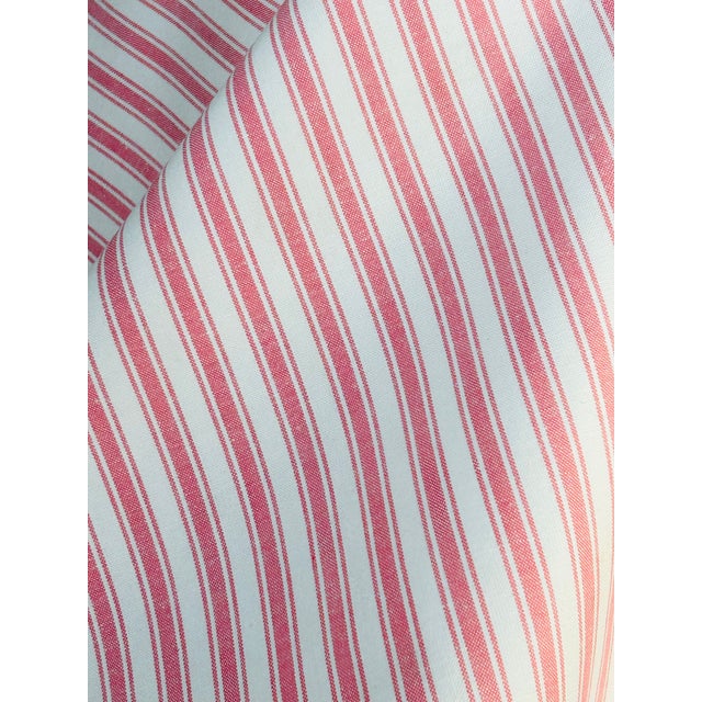 An all American narrow pink & white woven vertical stripe with a ¾” horizontal repeat. Multipurpose and in great...