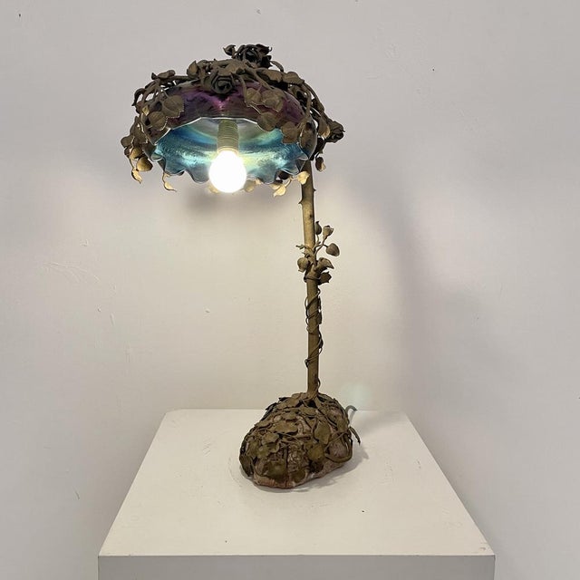 This unusual and very rare French floral Art Nouveau table lamp was made in Paris around 1910. It is cast out of bronze...