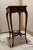 Vintage wood plant stand with a storage drewer. This piece has some wear to the wood because of it's age. It has been very...