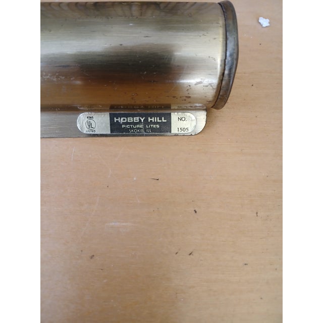 Thilamp is from the early 1970's, made by Hobby hill picture lites . It measures 14.5"w by10 " tall fully extended, it...