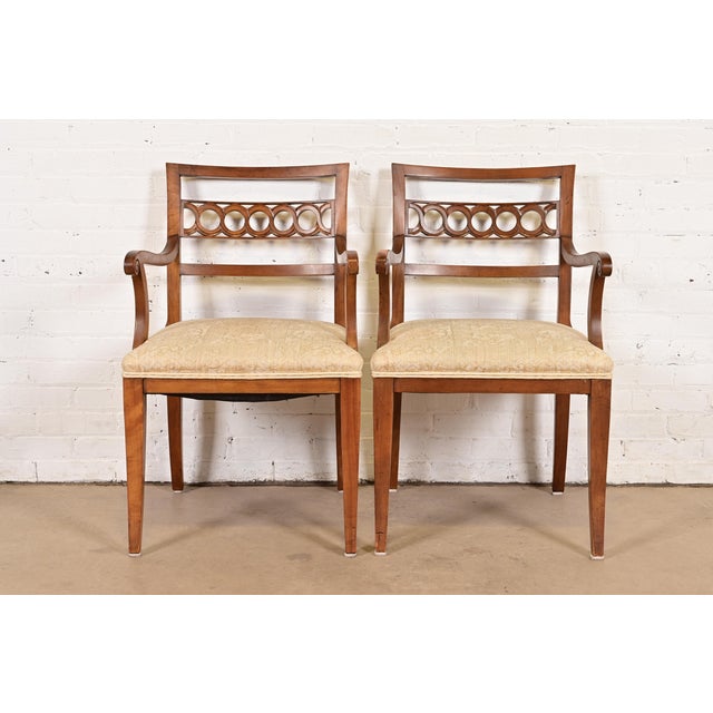A beautiful pair of Regency or Neoclassical style armchairs or dining captain chairs By Kindel Furniture USA, Circa 1960s...
