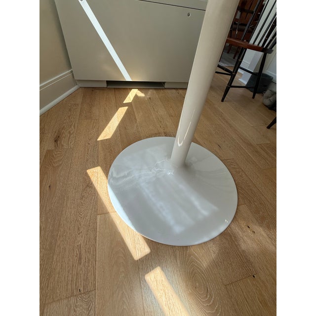 46” inch round table, 29” high Aria table from Room and Board. Top is bright white quartz, base is white. Purchased for...