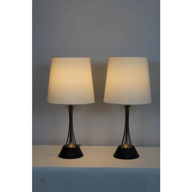 Pair of petite Gerald Thurston style table lamps. Sculptural presence. Structurally interesting . Brass finished wire...