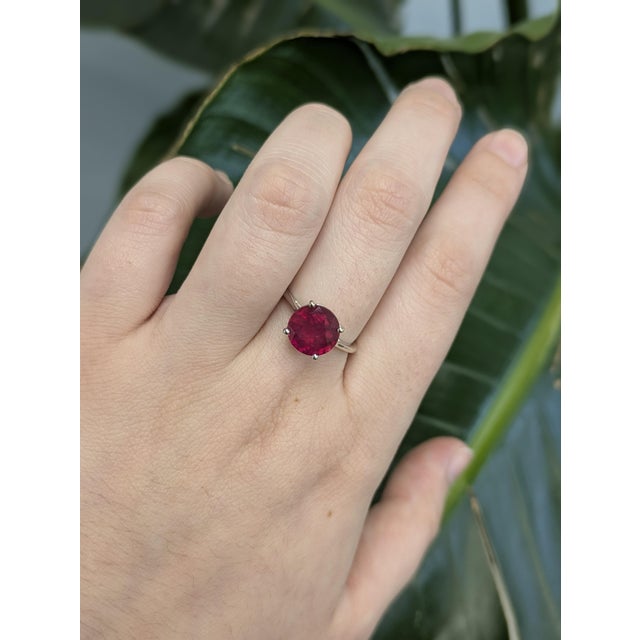 This beautiful ring features a 3.8 carat round ruby gemstone all set in solid 14K gold. This solitaire ring can be a...