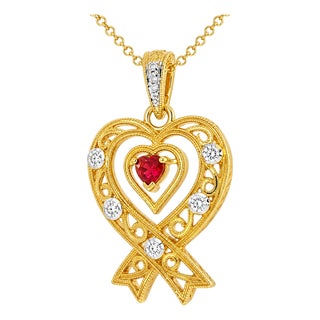 1970s 14K Yellow Gold Filigree Diamond Heart Red Sapphire Pendant For Sale