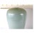 A pair of porcelain table lamps featuring softly tapered vase form bodies in a serene pale blue glaze with a crackle...