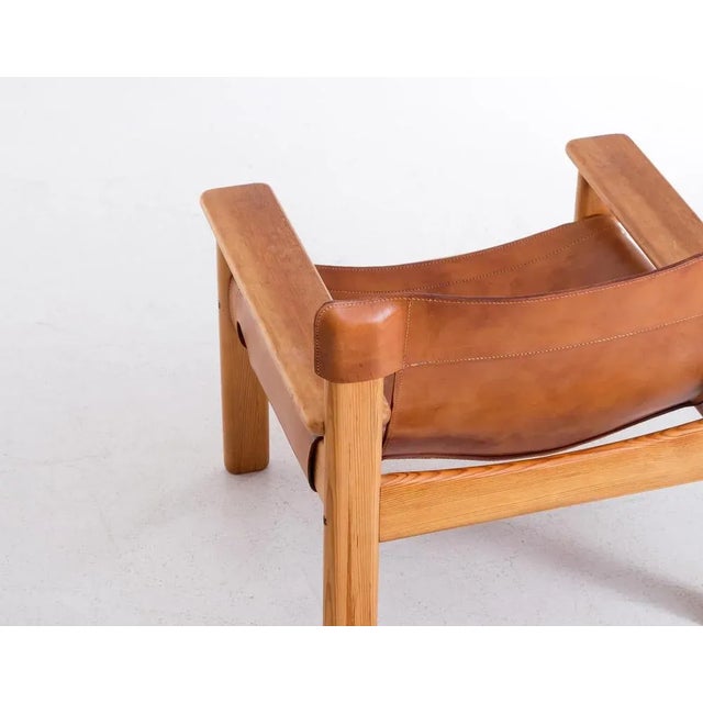 Natura' armchair by Karin Mobring, 1970s. Leather and pine wood. This piece is attributed to the mentioned designer/maker....