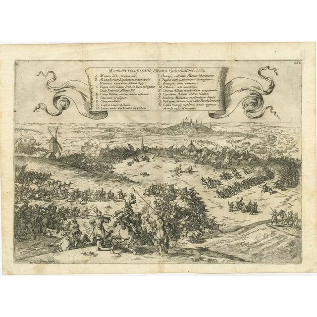 The print is a historical depiction of the siege of bergen (also known as mons) in hainaut in 1572, during the eighty...
