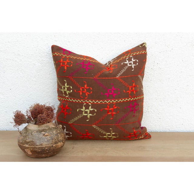 This 18-inch square pillow is a luminous masterpiece of Antique Phulkari craftsmanship, repurposed from a rare 19th-...