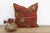 This 18-inch square pillow is a luminous masterpiece of Antique Phulkari craftsmanship, repurposed from a rare 19th-...