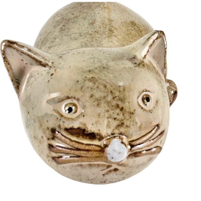 This vintage cat figurine is simply purrect. He is so incredibly cute in a very rustic way. He was expertly crafted in the...