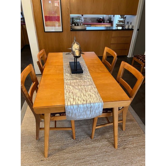 Bring the iconic warmth of mid-century modern design into your home with this stunning, comprehensive dining collection....