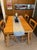 Bring the iconic warmth of mid-century modern design into your home with this stunning, comprehensive dining collection....