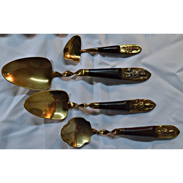 This Set Of Mid-Century Siam Serving Set Features 8 Servers With Brass With Rosewood Handles. All But The Cold Meat Fork...